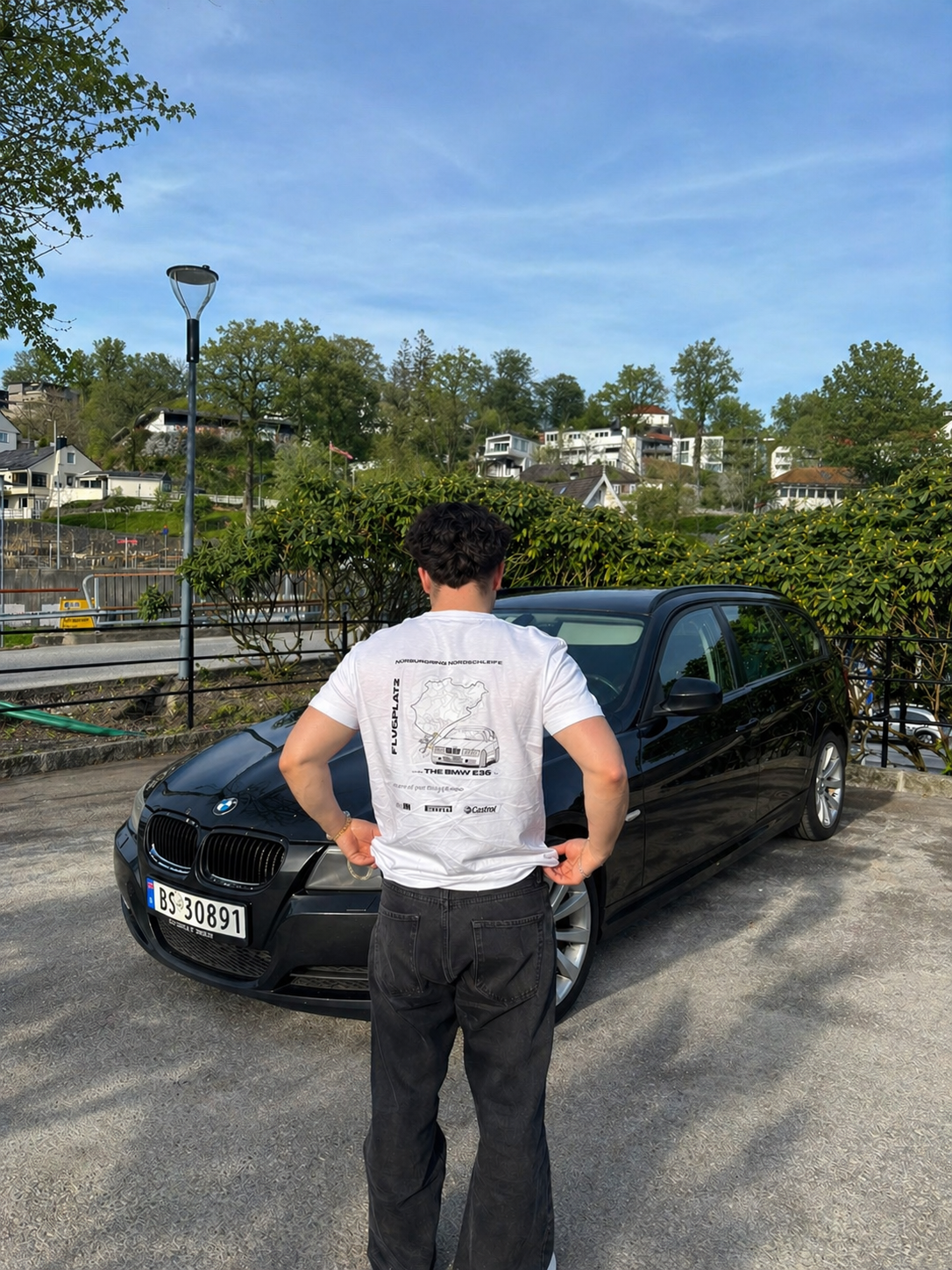 RINGWEAR Flugplatz BMW E36 tee worn in front of a black BMW E91